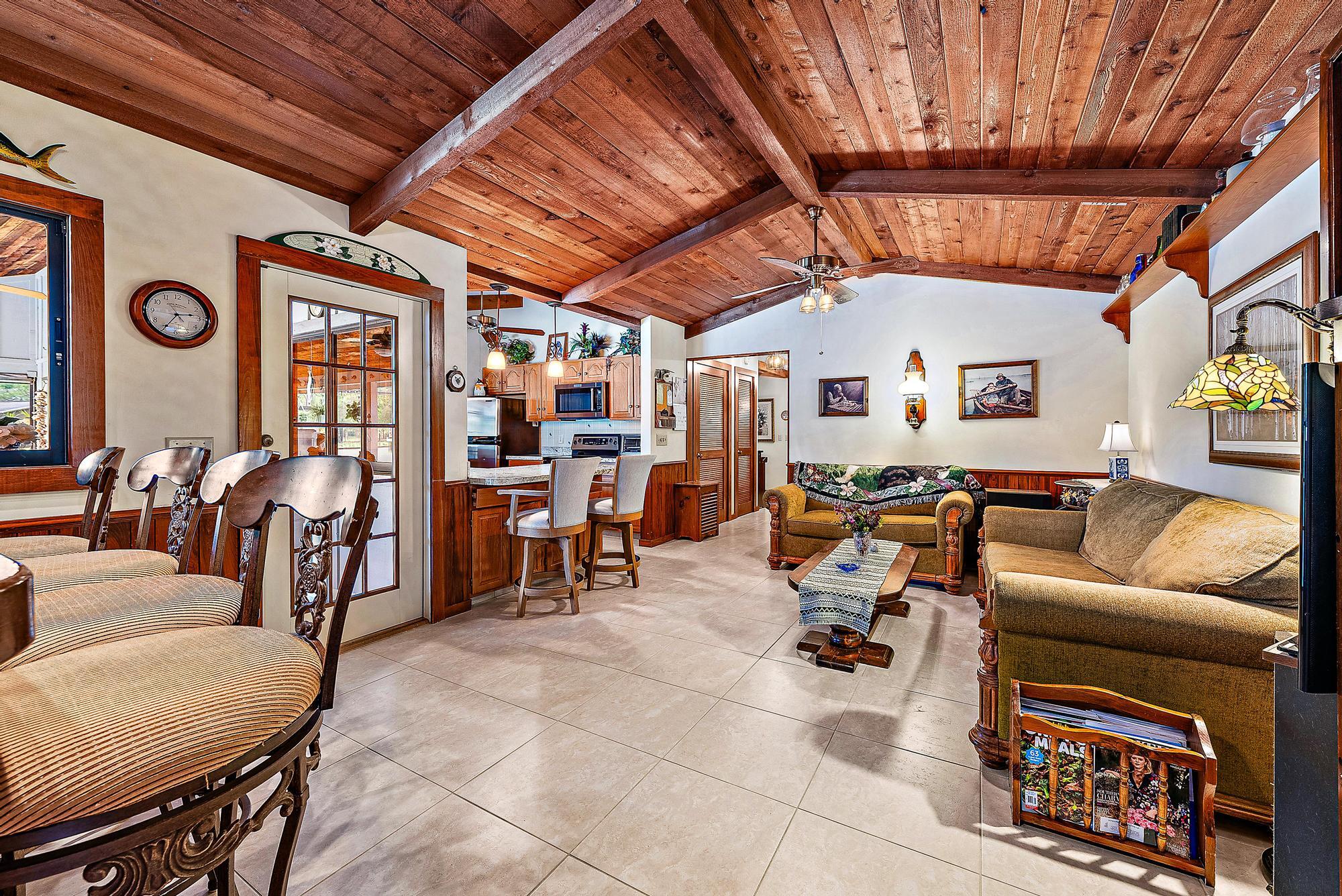 16800 128th Trail North Jupiter, FL 33478 - Photo 14 of 52 a living room with furniture and a window