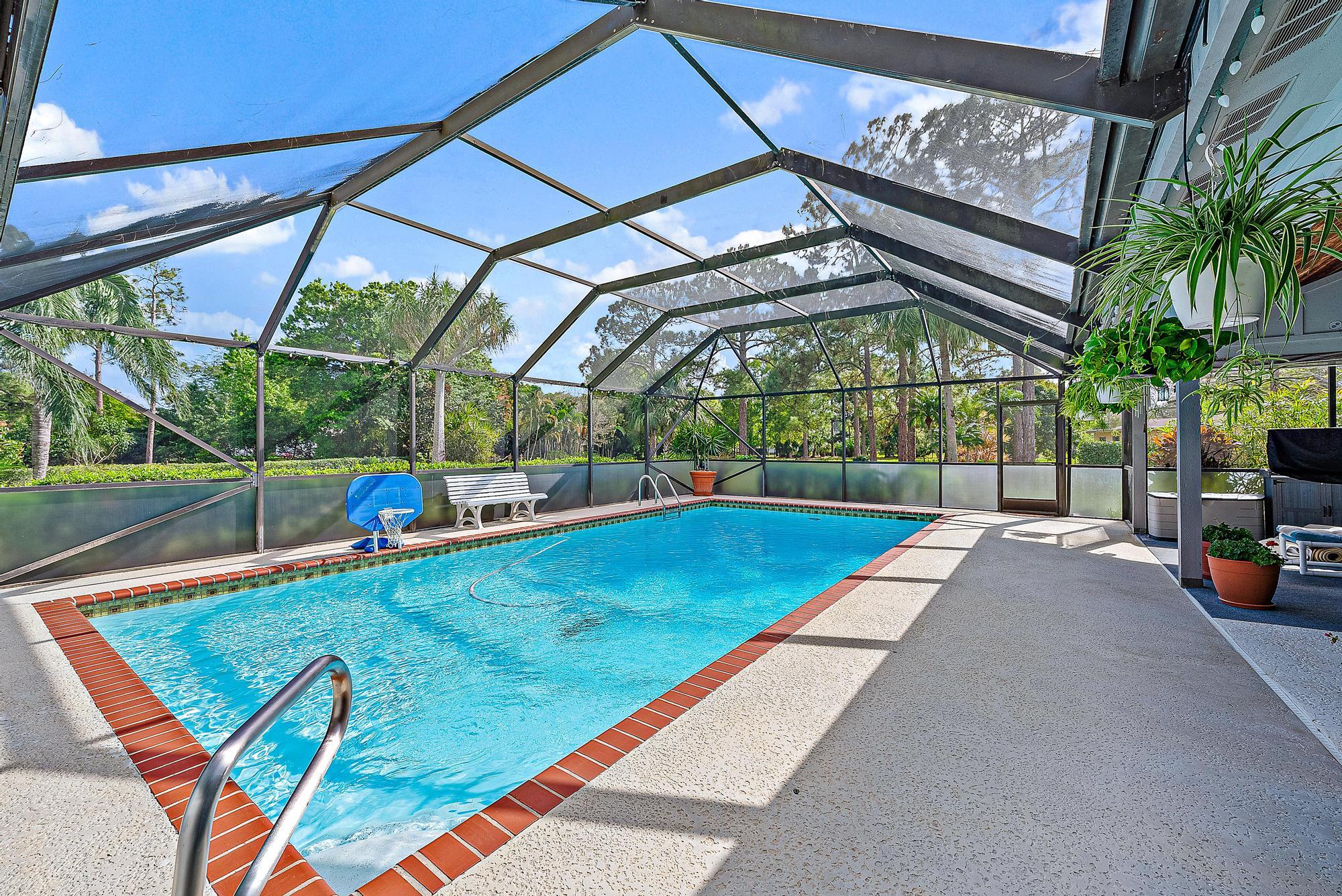 16800 128th Trail North Jupiter, FL 33478 - Photo 52 of 52 a view of swimming pool with a patio