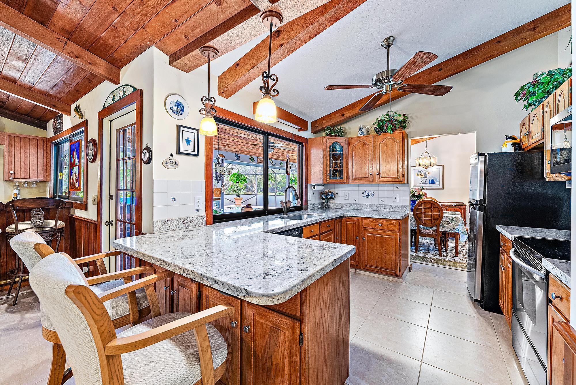 16800 128th Trail North Jupiter, FL 33478 - Photo 10 of 52 a view of an outdoor kitchen