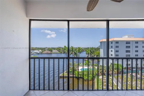 a view of a kitchen cabinets and wooden floor