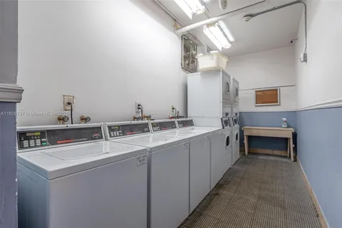 a dining space with furniture and wooden floor