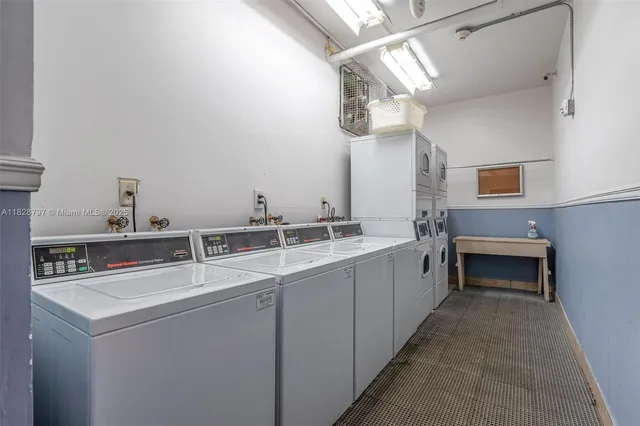 a dining space with furniture and wooden floor