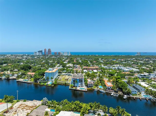 an aerial view of a city with lots of residential buildings