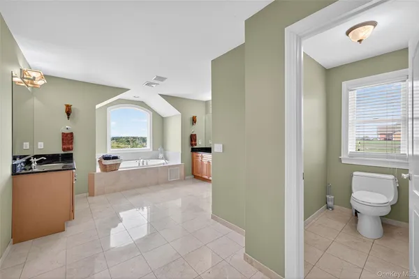 a view of a living room with a toilet