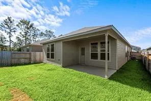 a view of front of house with a yard