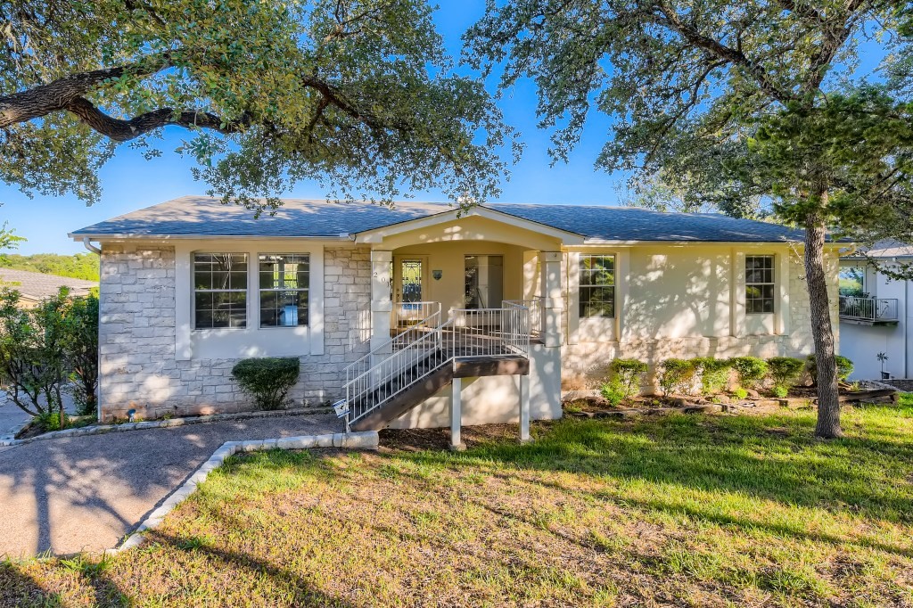201 Capri Lakeway, TX 78734 - Photo 1 of 1 a view of a house with a swimming pool