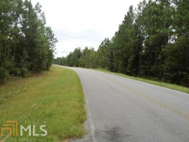 0 Williams Road Guyton, GA 31312 - Photo 1 of 1 a view of a field with trees in the background