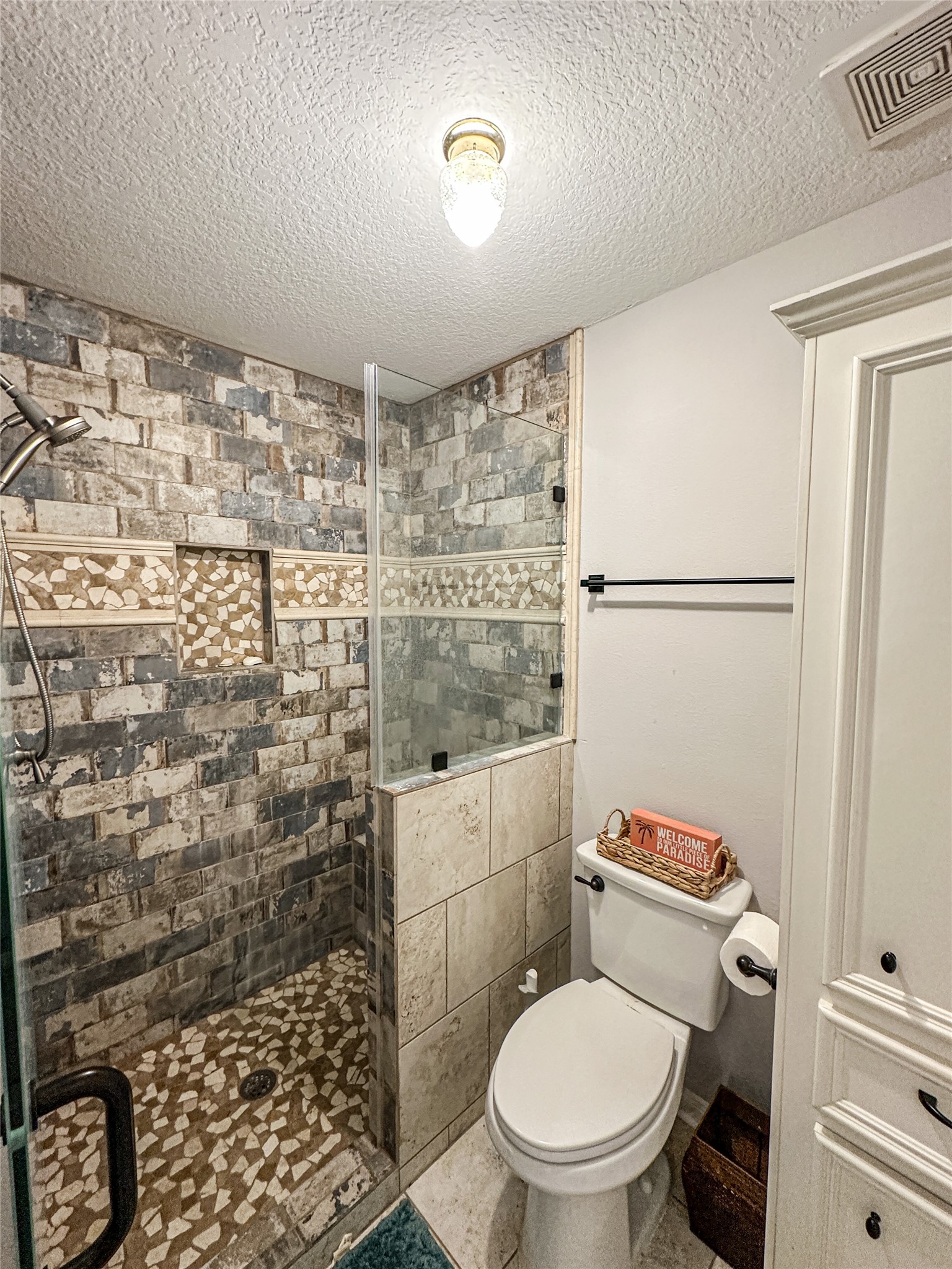 11471 Ketch Court Willis, TX 77318 - Photo 19 of 33 a bathroom with a toilet and a shower