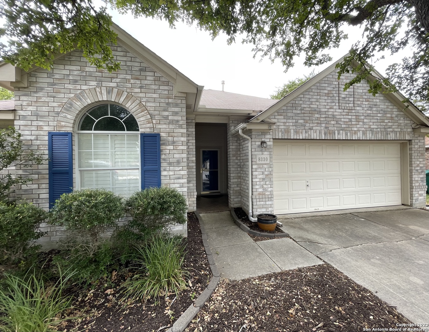 8330 Coppergate Converse, TX 78109 - Photo 1 of 1 a front view of a house with garage