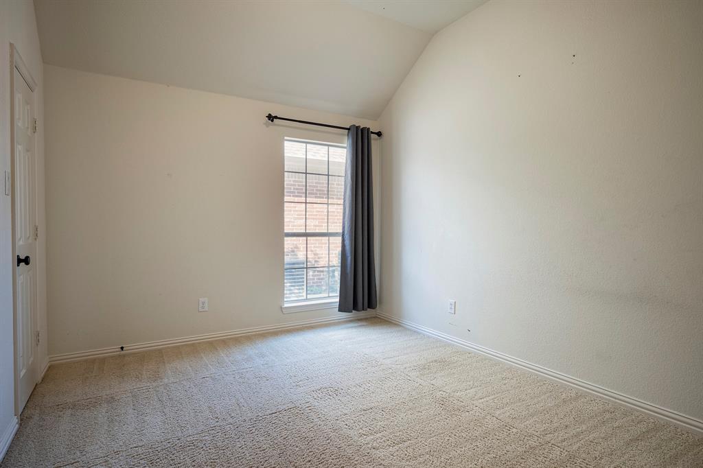 1138 Amy Drive Allen, TX 75013 - Photo 19 of 26 an empty room with windows