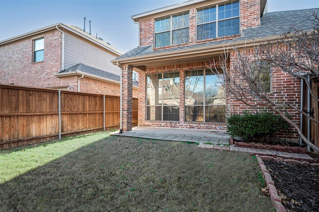 1138 Amy Drive Allen, TX 75013 - Photo 26 of 26 a view of a house with a yard and large window