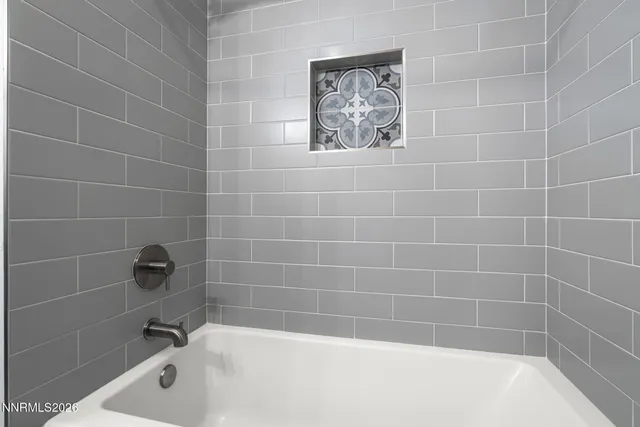 a bathroom with a bathtub