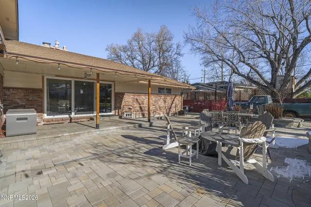 a view of a lounge chairs in a patio