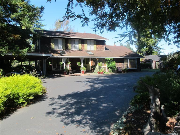 1801 Green Hill Road Sebastopol, CA 95472 - Photo 1 of 1 a front view of a house with garden