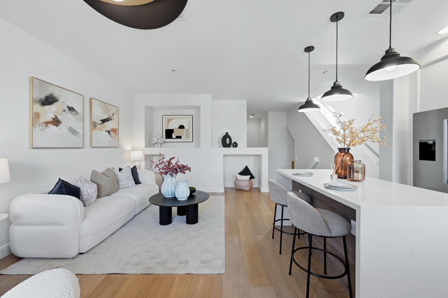 35005 11th Street Union City, CA 94587 - Photo 11 of 80 a living room with furniture and a chandelier