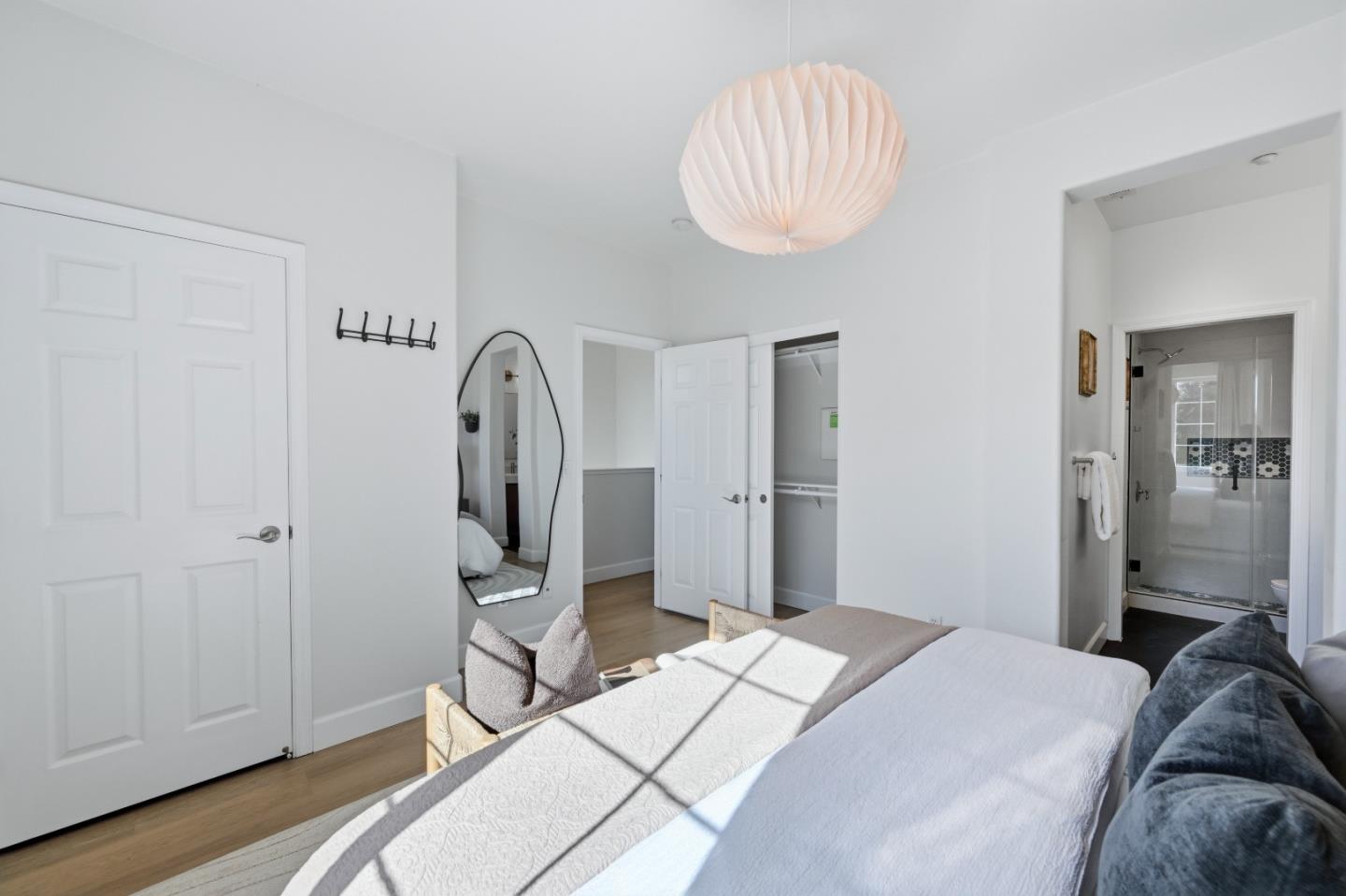 35005 11th Street Union City, CA 94587 - Photo 41 of 80 a bedroom with a bed and a chandelier