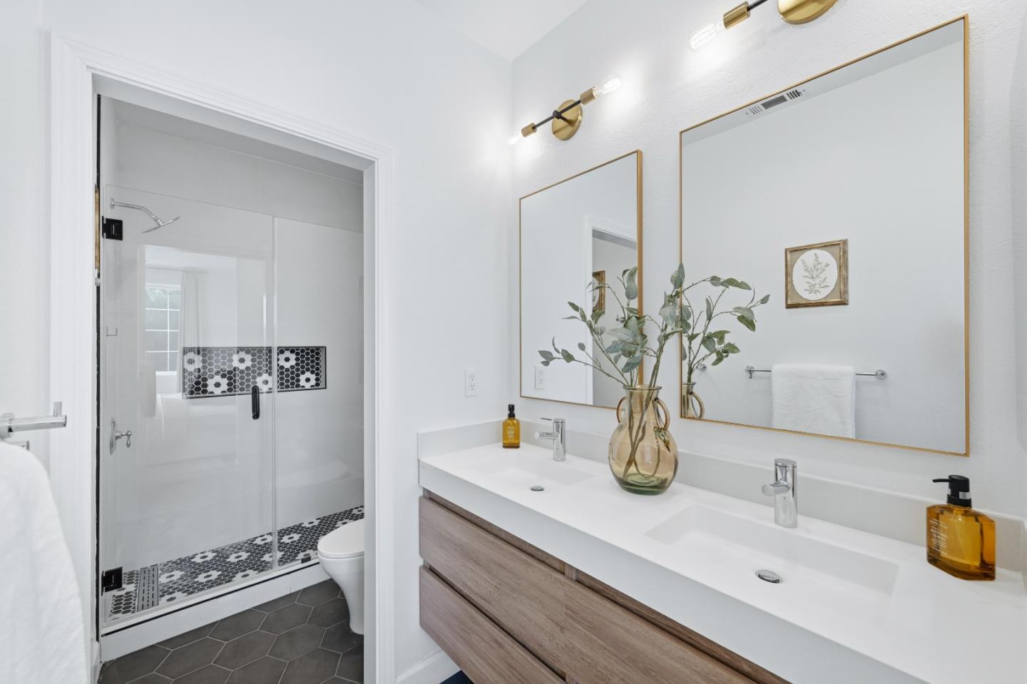 35005 11th Street Union City, CA 94587 - Photo 46 of 80 a bathroom with a sink and a mirror