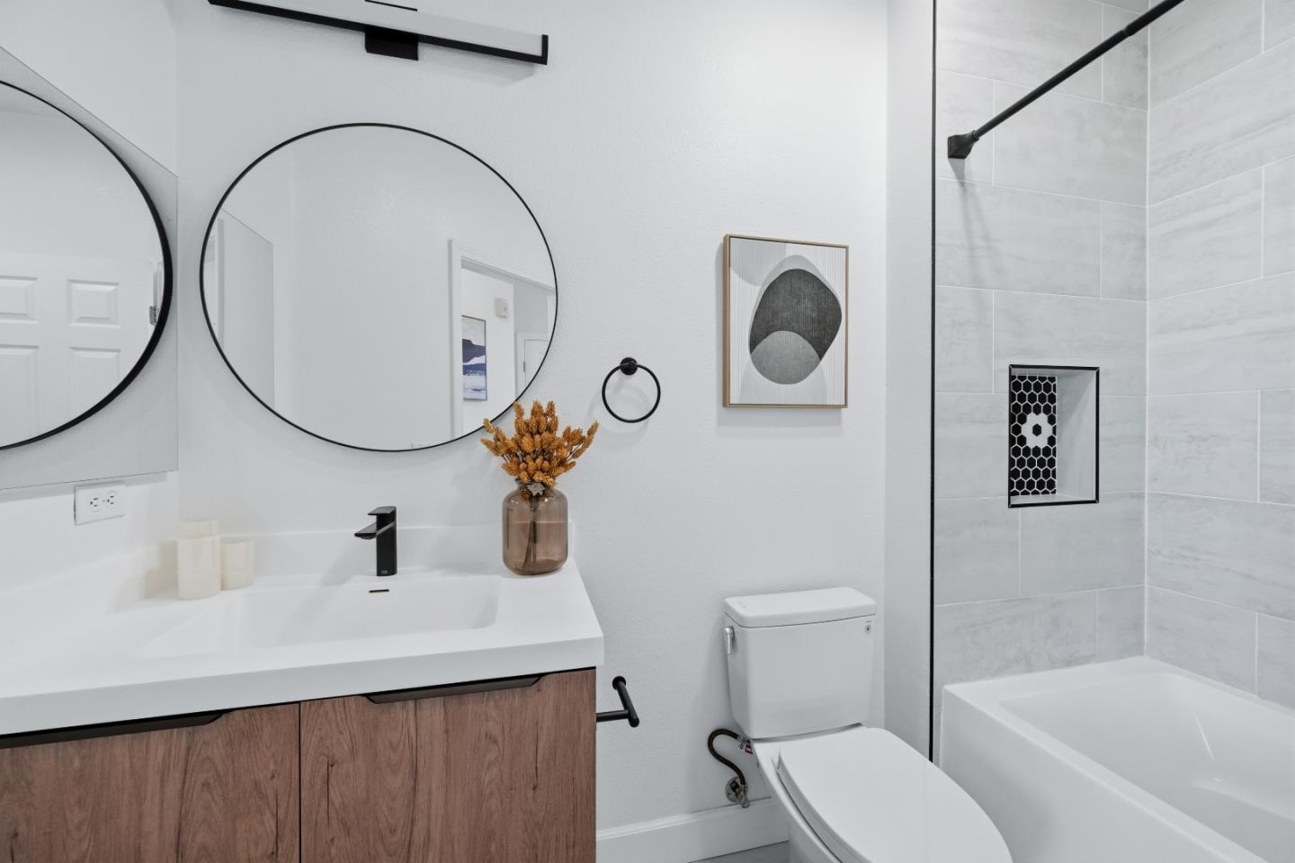 35005 11th Street Union City, CA 94587 - Photo 53 of 80 a bathroom with a sink a toilet and a mirror