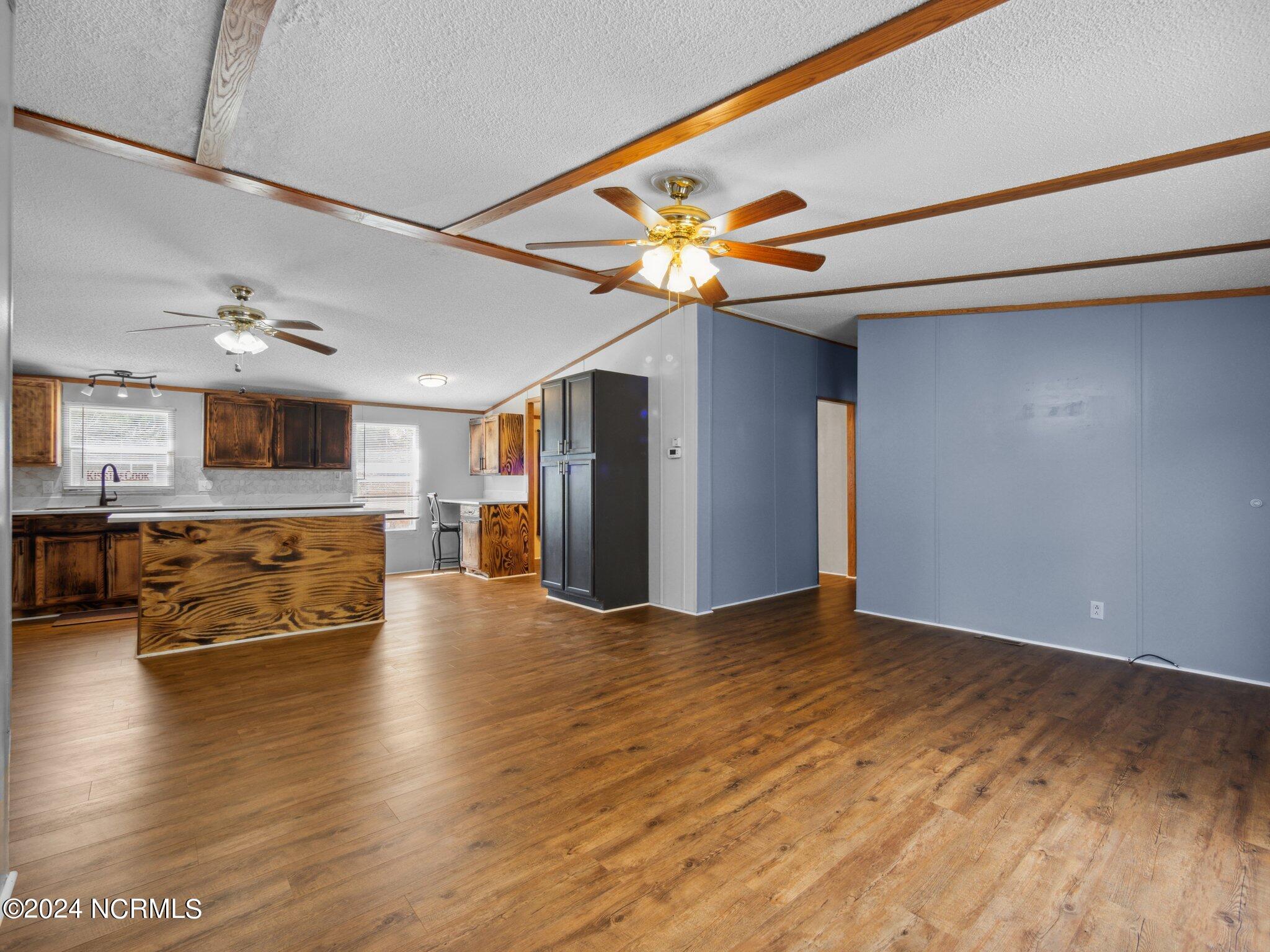 129 Old Freeman Road Swansboro, NC 28584 - Photo 22 of 51 Living Room & Kitchen