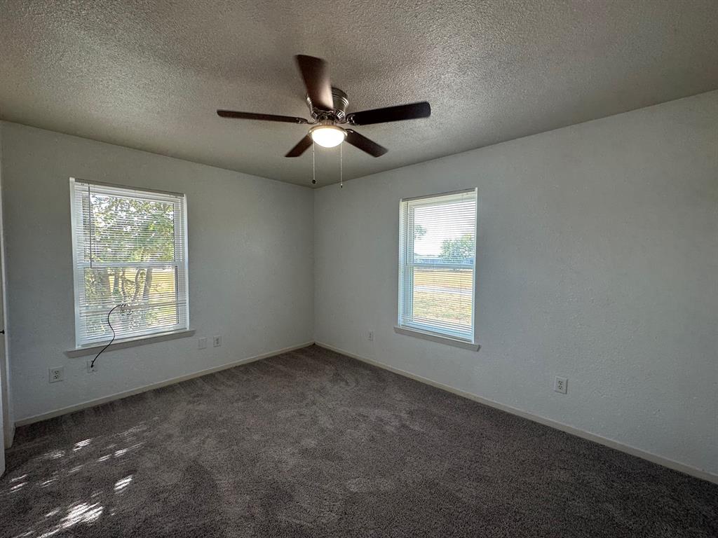 2520 County Road 406 McKinney, TX 75071 - Photo 5 of 19 a view of empty room with windows