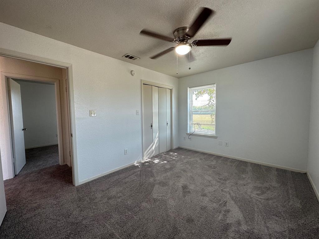 2520 County Road 406 McKinney, TX 75071 - Photo 6 of 19 a view of a livingroom with a ceiling fan and window