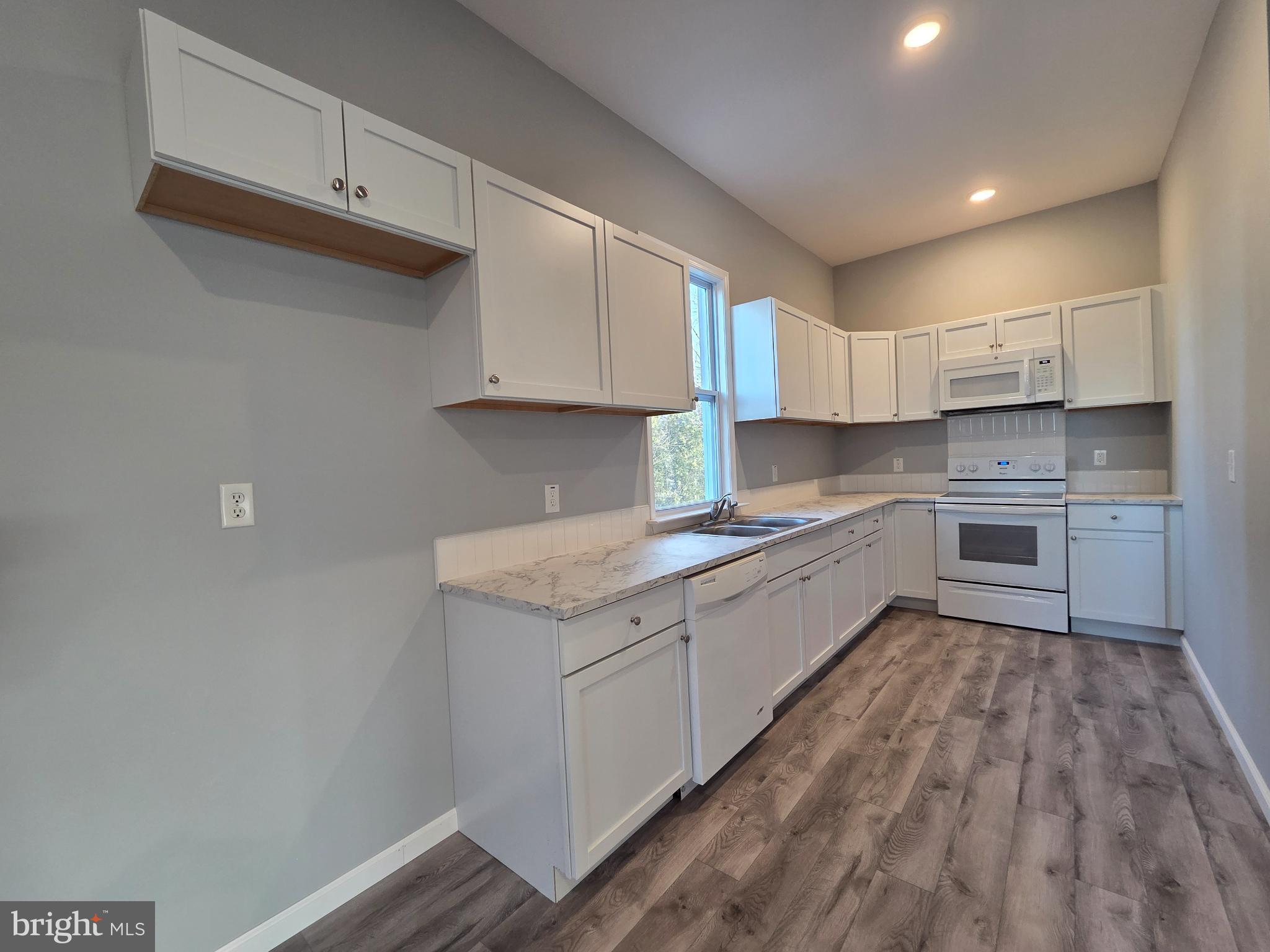 340 Red Mill Road Etters, PA 17319 - Photo 14 of 25 Bright and airy modern kitchen space.