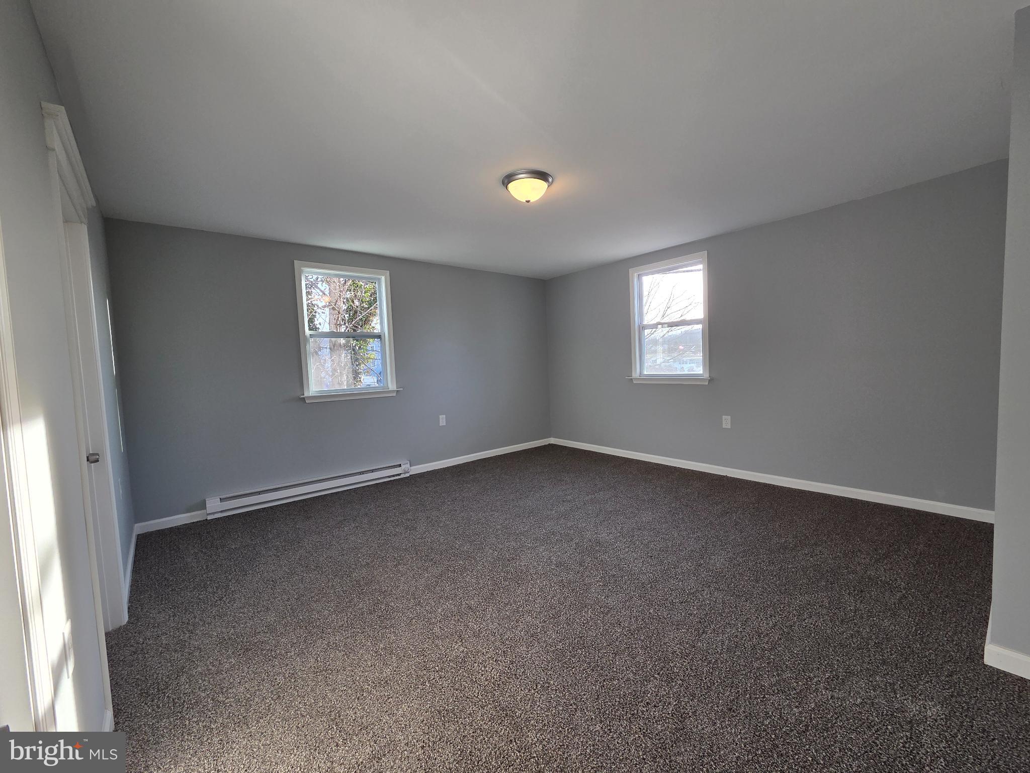 340 Red Mill Road Etters, PA 17319 - Photo 7 of 25 Spacious, light-filled room with fresh decor.