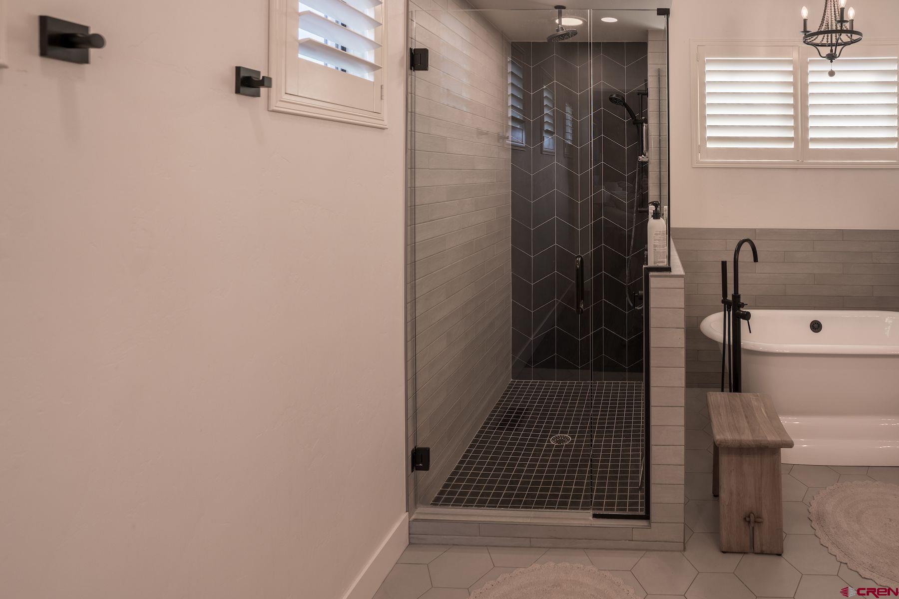 67 Range Road Durango, CO 81303 - Photo 16 of 34 a bathroom with a shower and a toilet