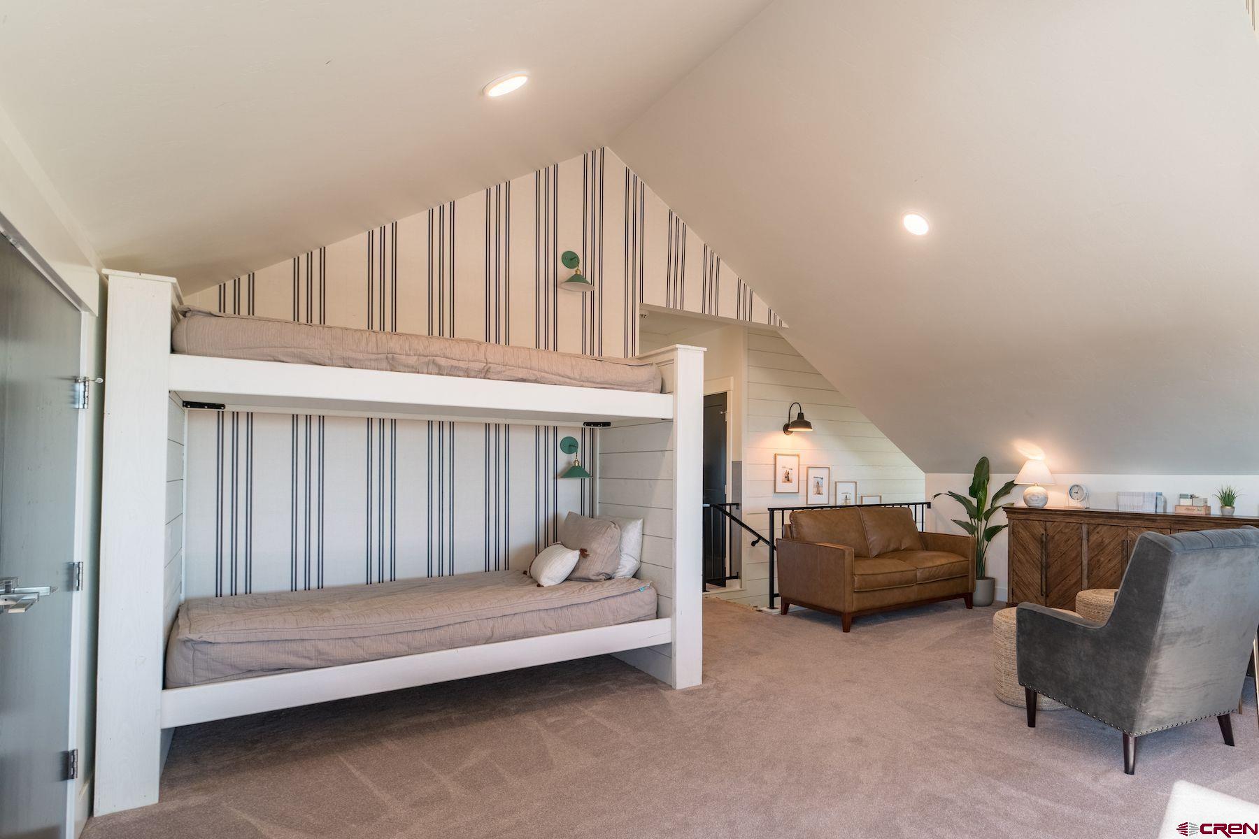 67 Range Road Durango, CO 81303 - Photo 20 of 34 a bedroom with furniture and a window