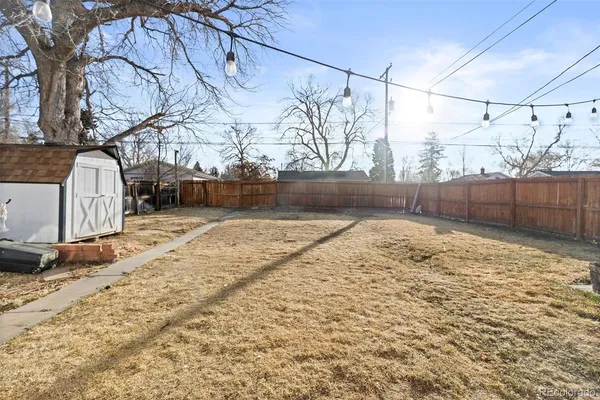a view of a backyard of the house
