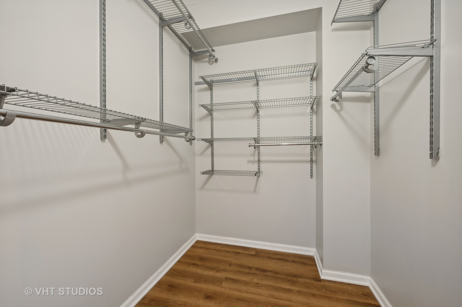 4848 North Sheridan Road, Unit 403 Chicago, IL 60640 - Photo 17 of 21 a view of a room with racks on the wall