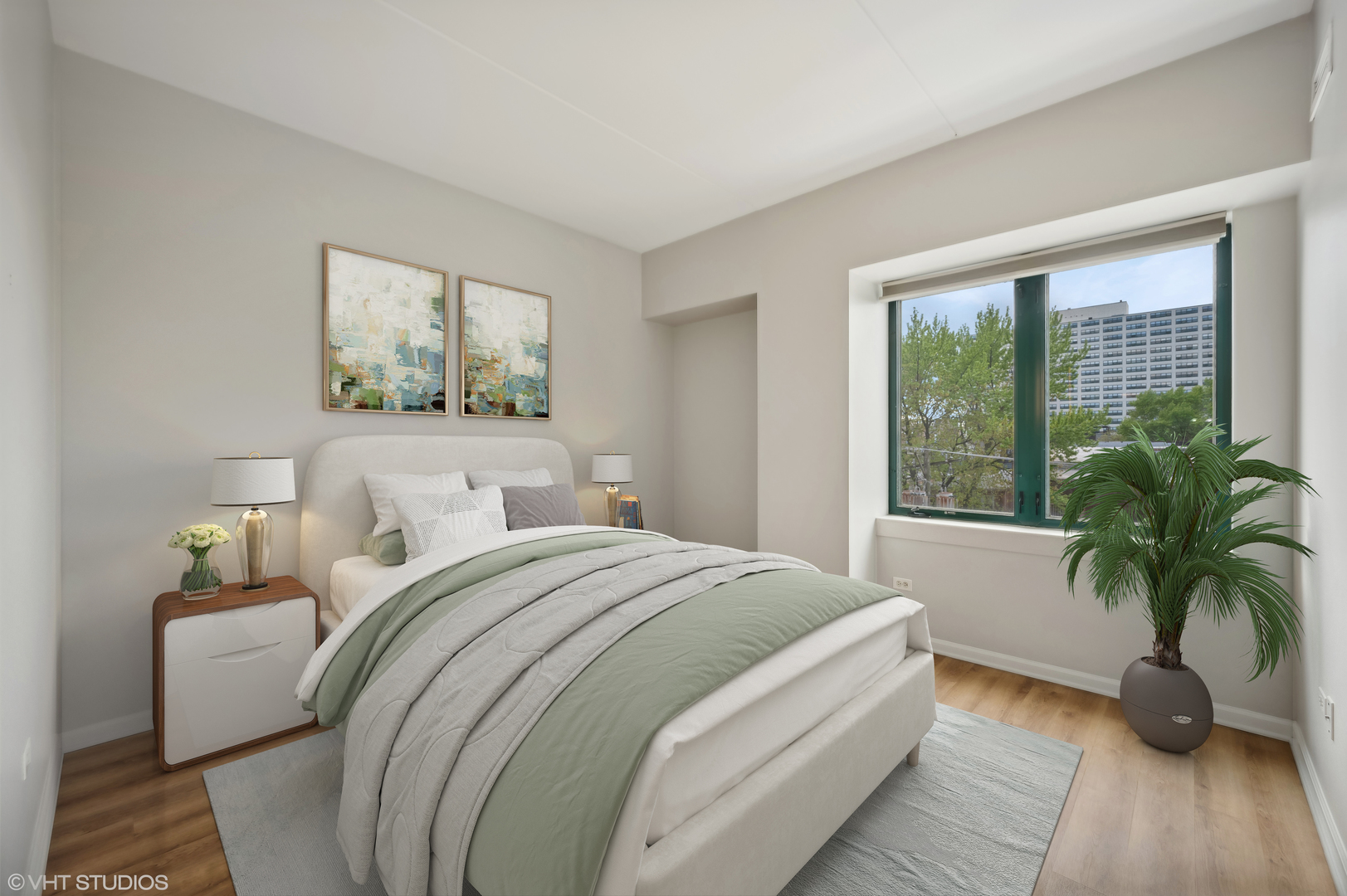 4848 North Sheridan Road, Unit 403 Chicago, IL 60640 - Photo 5 of 21 a bedroom with bed and a large window