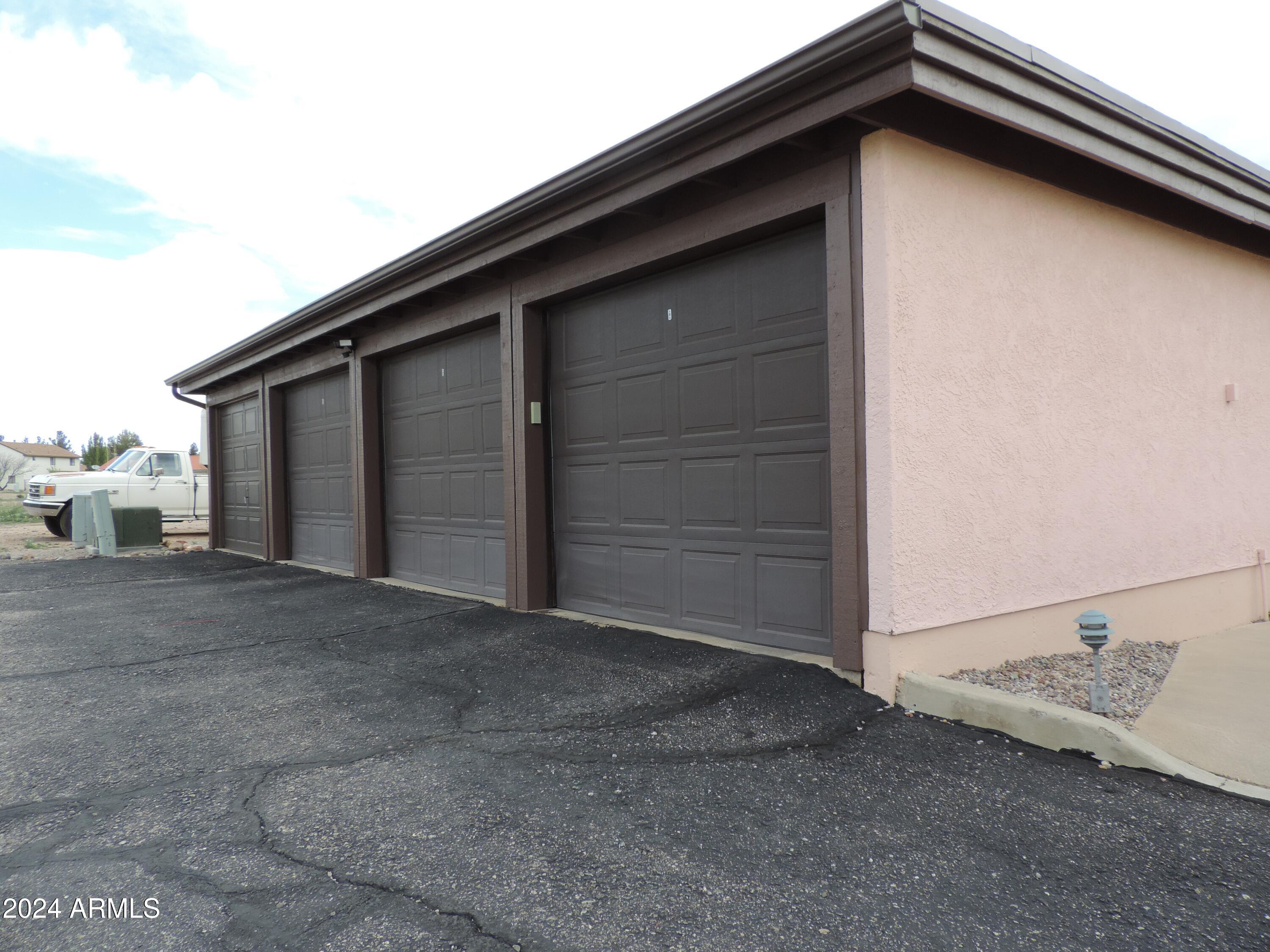 1762 Corte Encantada, Unit E Sierra Vista, AZ 85635 - Photo 9 of 10 a backyard of a house
