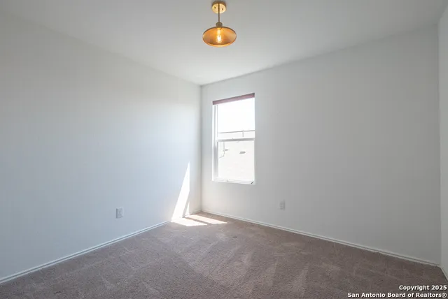a view of a room with window and window