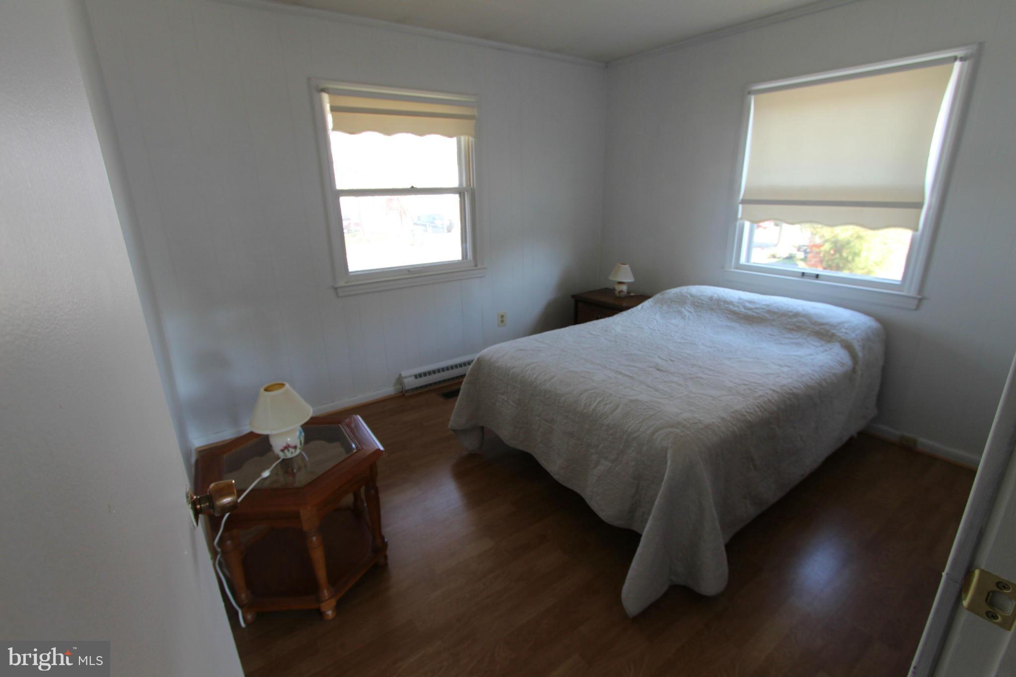 1010 South Hoga Road Sterling, VA 20164 - Photo 14 of 20 a bedroom with a bed and a window