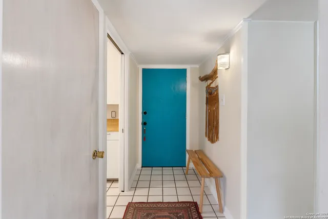 a view of hallway with walk in closet