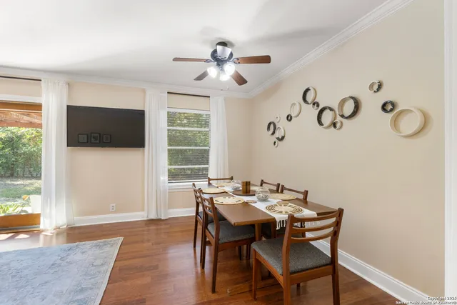 a view of a dining room with furniture window and outside view