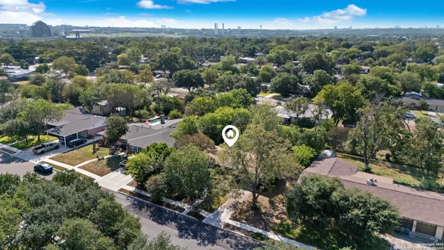 an aerial view of a city with lots of residential buildings