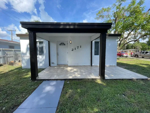 a view of a porch with a yard