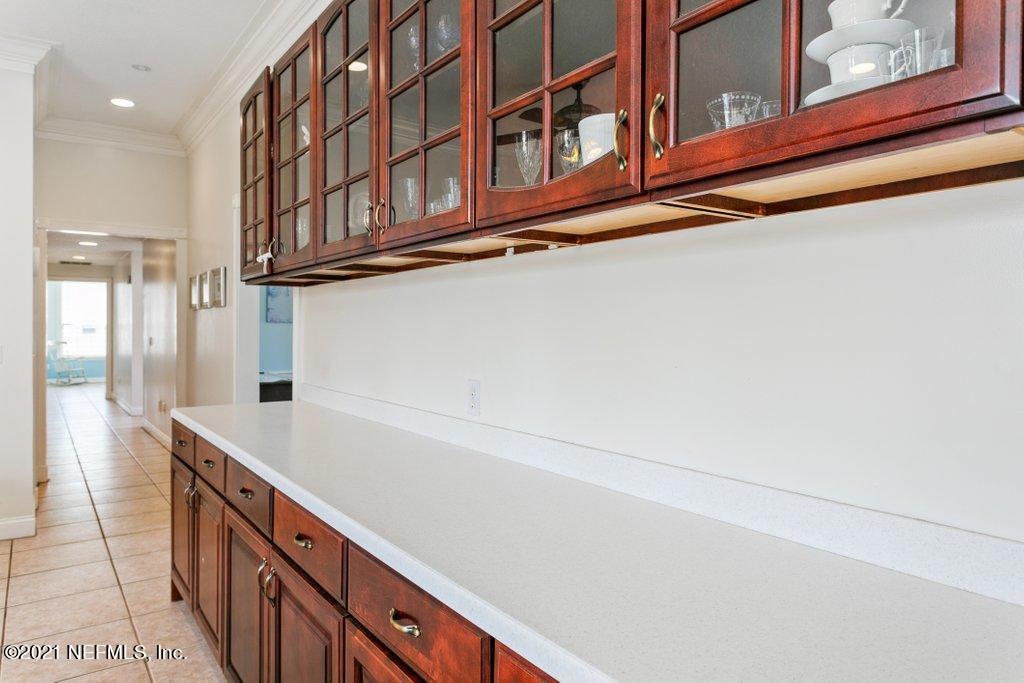 55268 Deer Run Road Callahan, FL 32011 - Photo 21 of 59 a kitchen with stainless steel appliances a sink and a refrigerator