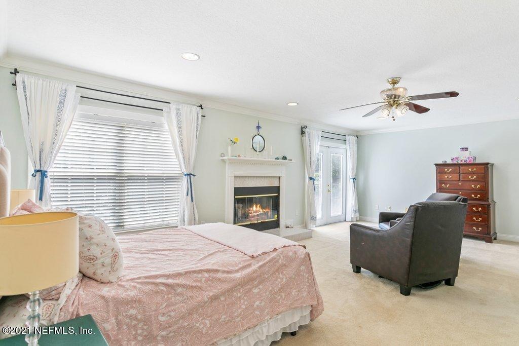 55268 Deer Run Road Callahan, FL 32011 - Photo 34 of 59 a bedroom with a bed furniture and a window