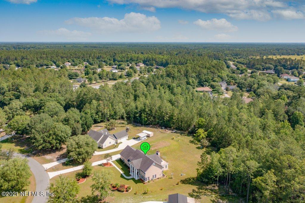 55268 Deer Run Road Callahan, FL 32011 - Photo 53 of 59 an aerial view of a house with a yard