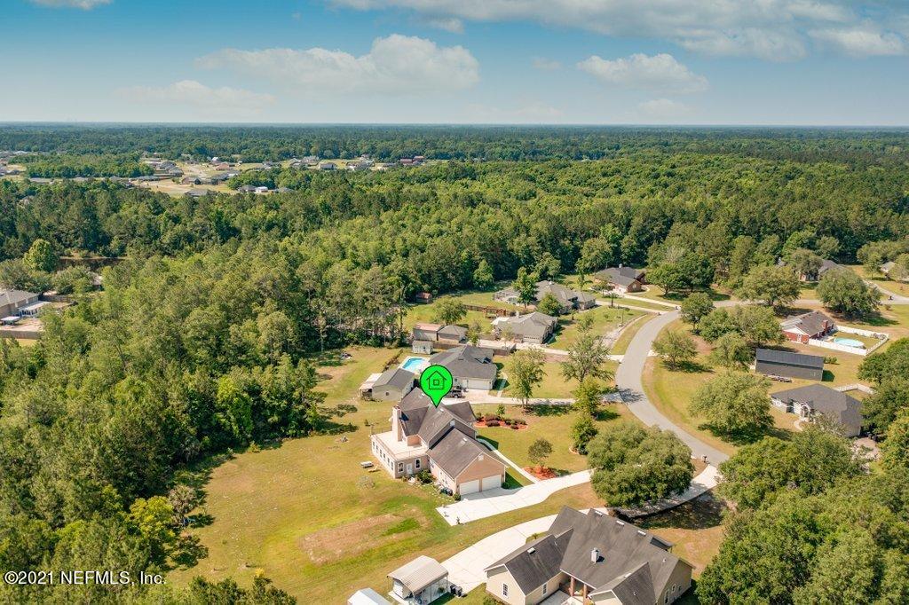 55268 Deer Run Road Callahan, FL 32011 - Photo 55 of 59 an aerial view of residential houses with outdoor space