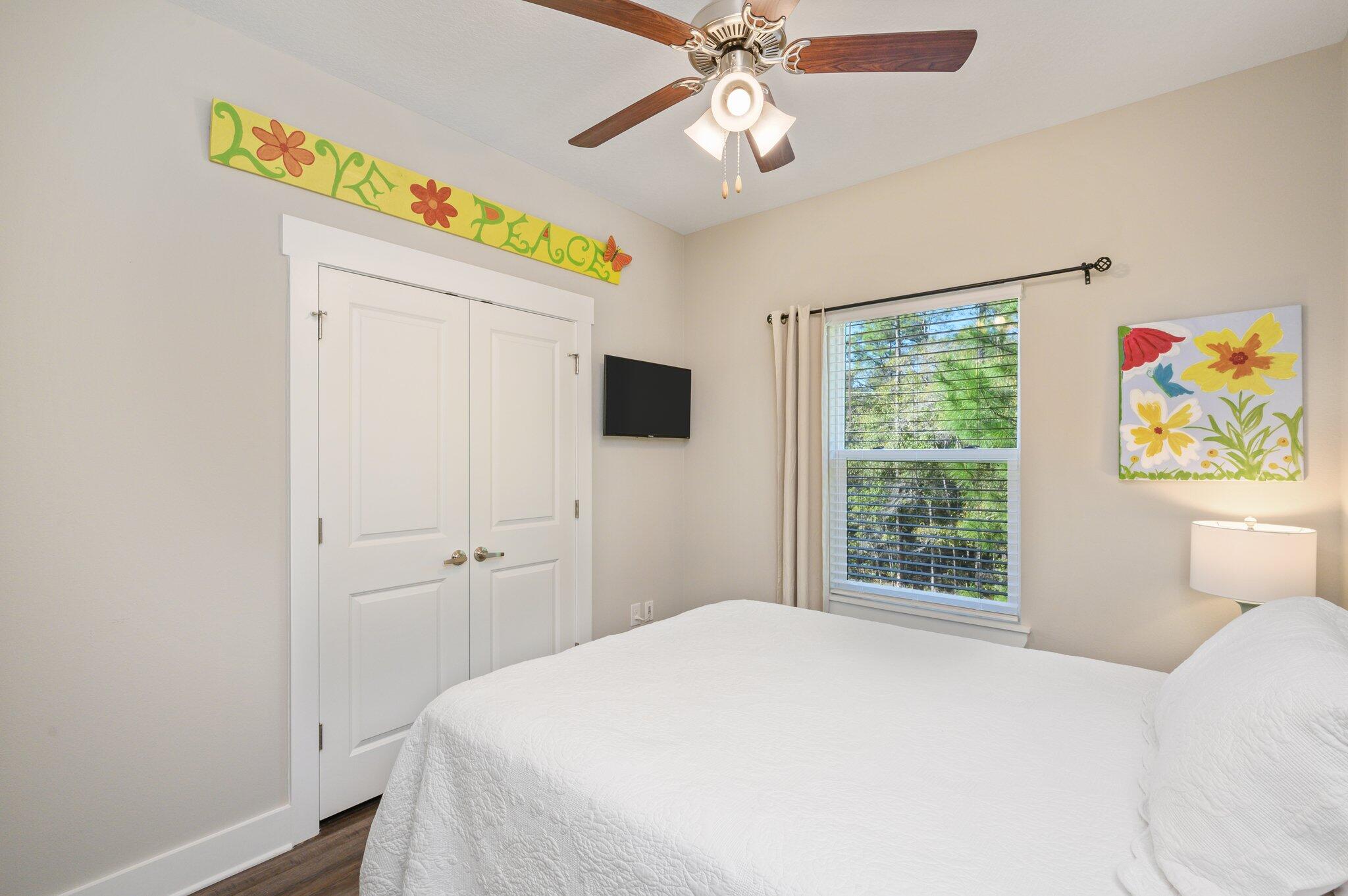 280 North Sand Palm Road Freeport, FL 32439 - Photo 24 of 34 a bedroom with a bed and a window