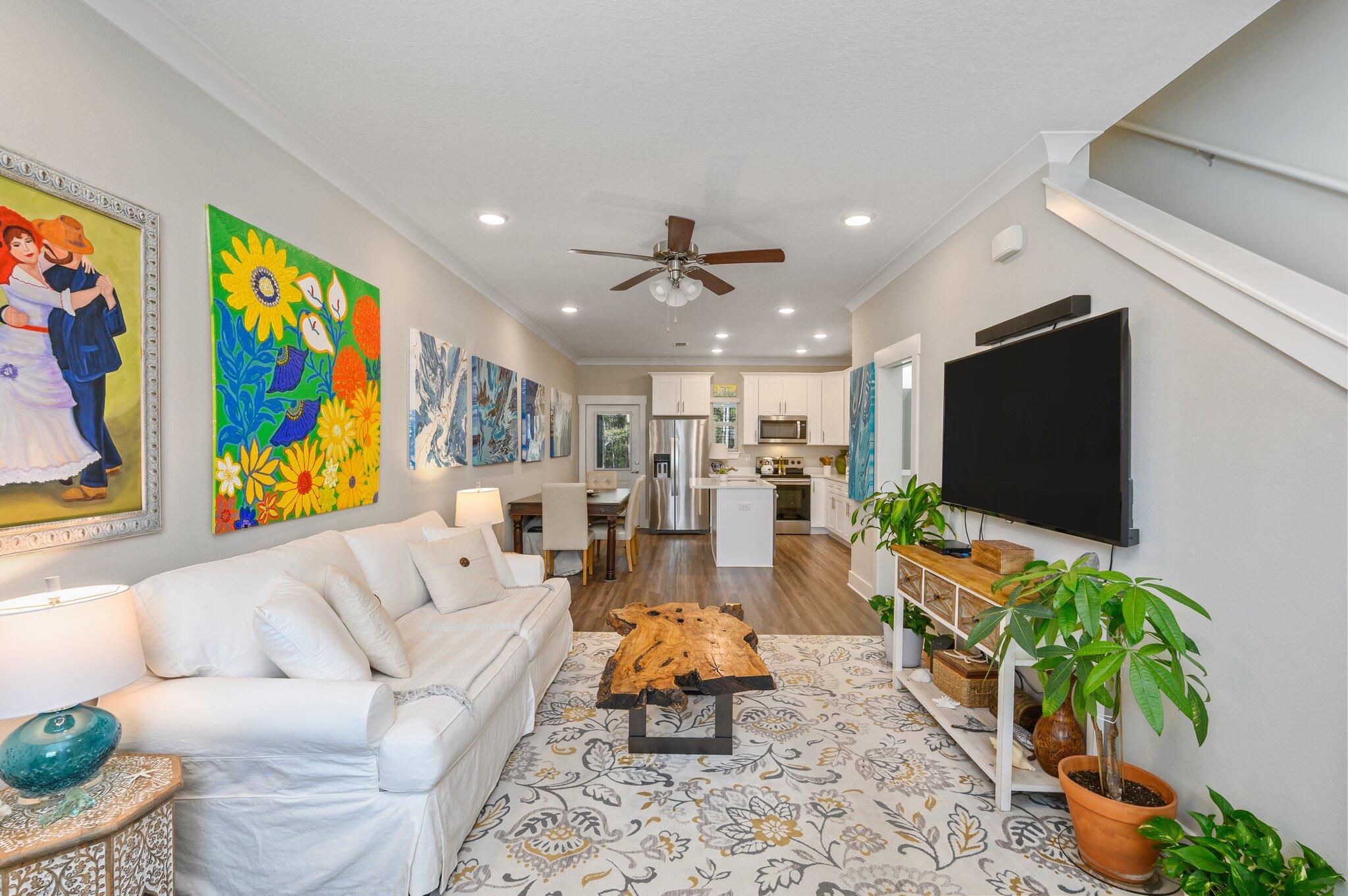 280 North Sand Palm Road Freeport, FL 32439 - Photo 3 of 34 a living room with furniture and a flat screen tv