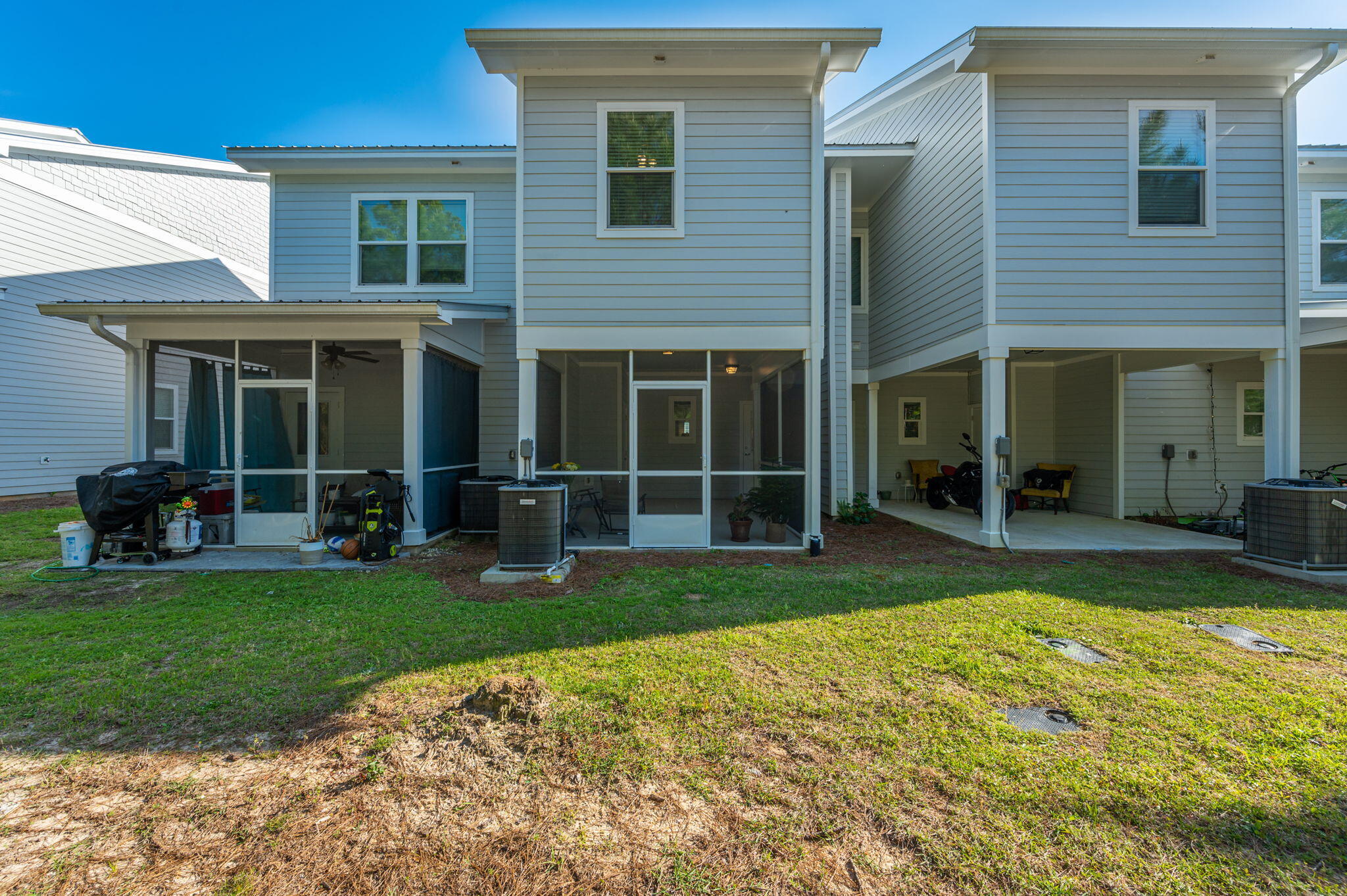 280 North Sand Palm Road Freeport, FL 32439 - Photo 33 of 34 a view of a house with a yard and sitting area