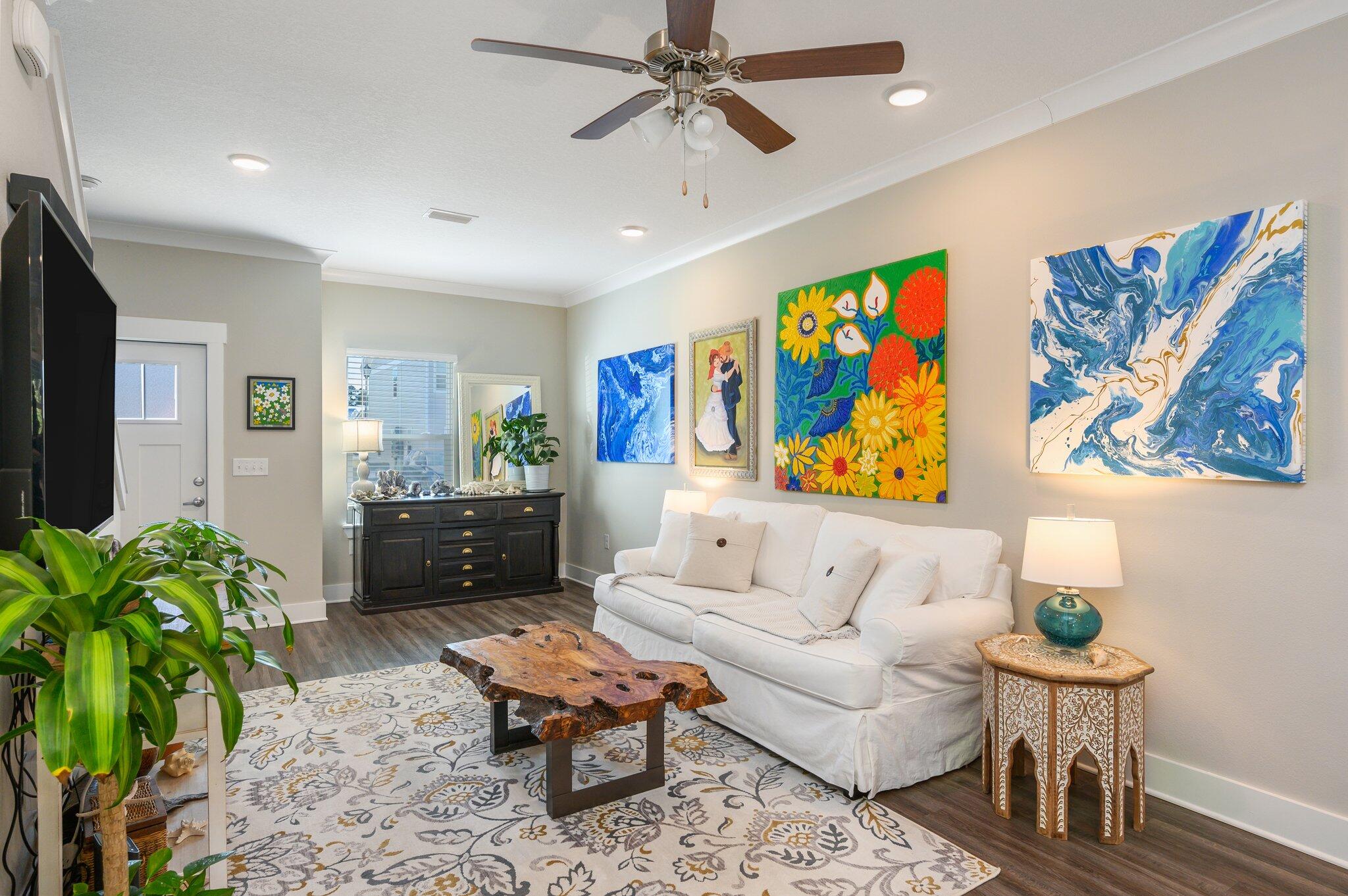 280 North Sand Palm Road Freeport, FL 32439 - Photo 5 of 34 a living room with furniture a couch and a potted plant