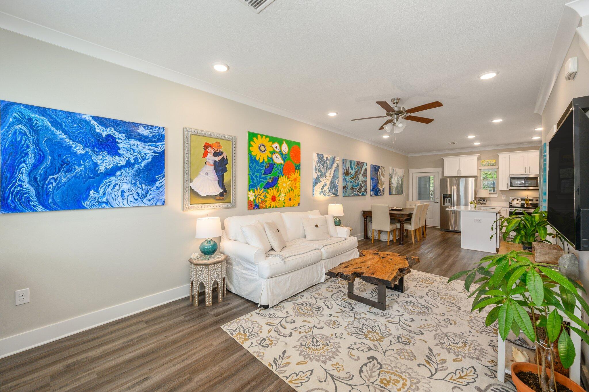 280 North Sand Palm Road Freeport, FL 32439 - Photo 6 of 34 a living room with furniture ceiling fan and a rug