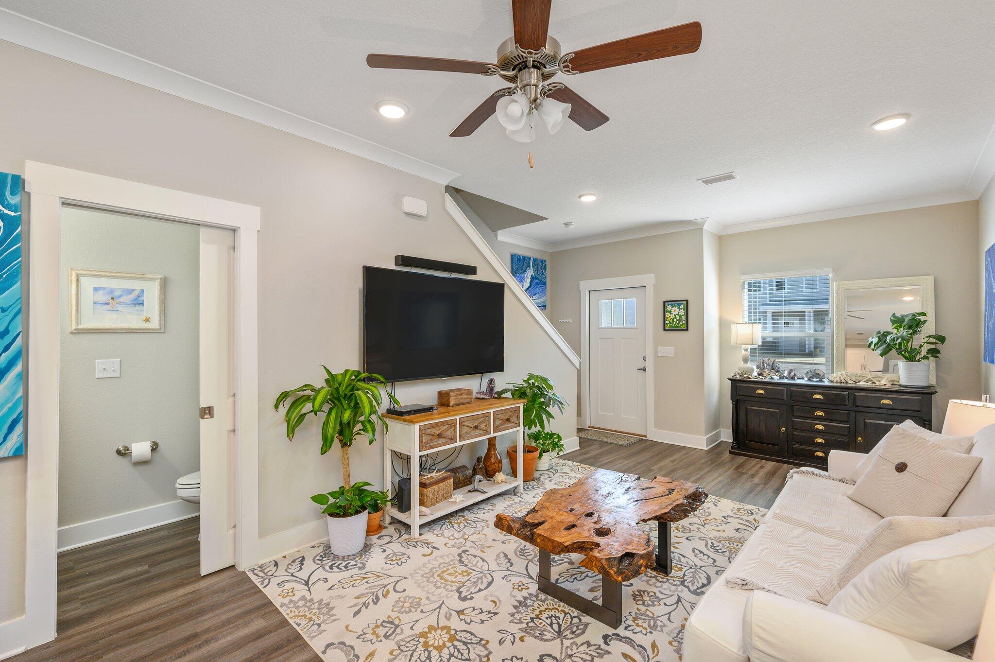 280 North Sand Palm Road Freeport, FL 32439 - Photo 7 of 34 a living room with furniture and a flat screen tv