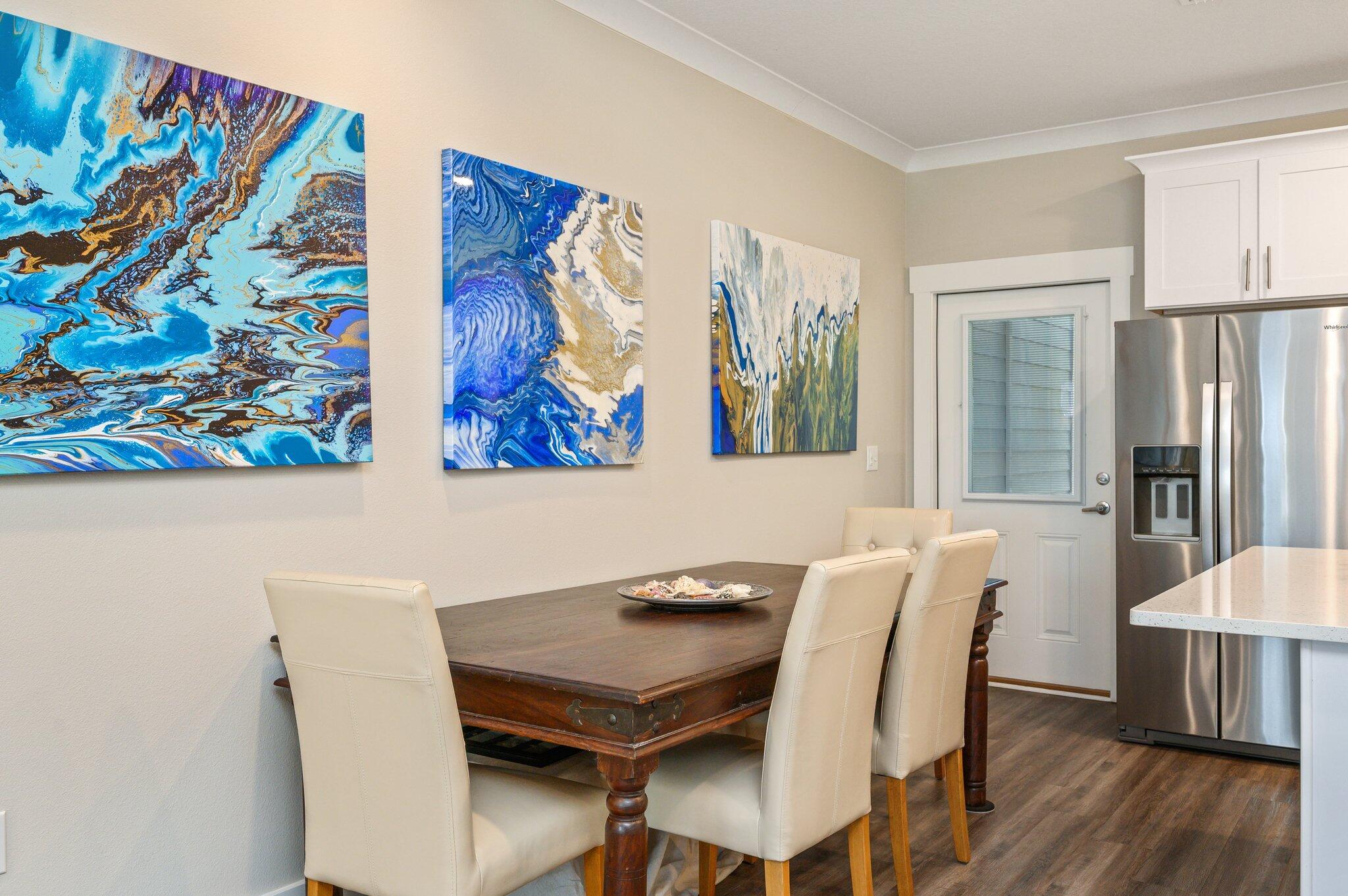 280 North Sand Palm Road Freeport, FL 32439 - Photo 9 of 34 a view of a dining room with furniture and wooden floor